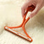pet hair remover tool on carpet